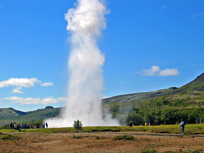 Strokkur erupts while Tove watches