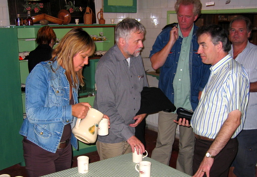 Ursa pouring tea for attentive Martin and slightly absent looking Geir and Torbjørn