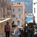 A travller is reaching the top of the citadel in Calvi