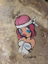A charming Calvi girl graphittied on to a wall in the Calvi citadel
