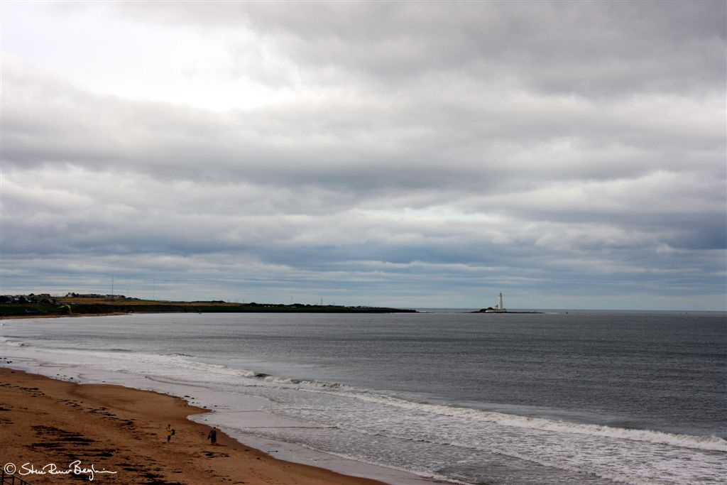 Sandstrand og fyrtårn ved Whitley Bay