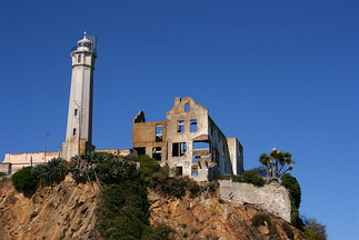 Light house and fallen-down prison-warden's building