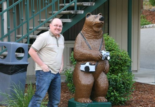 Idar next to camera-bear at Cedar Lodge