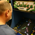 Idar playing Galaga at Santa Monica Pier arcade