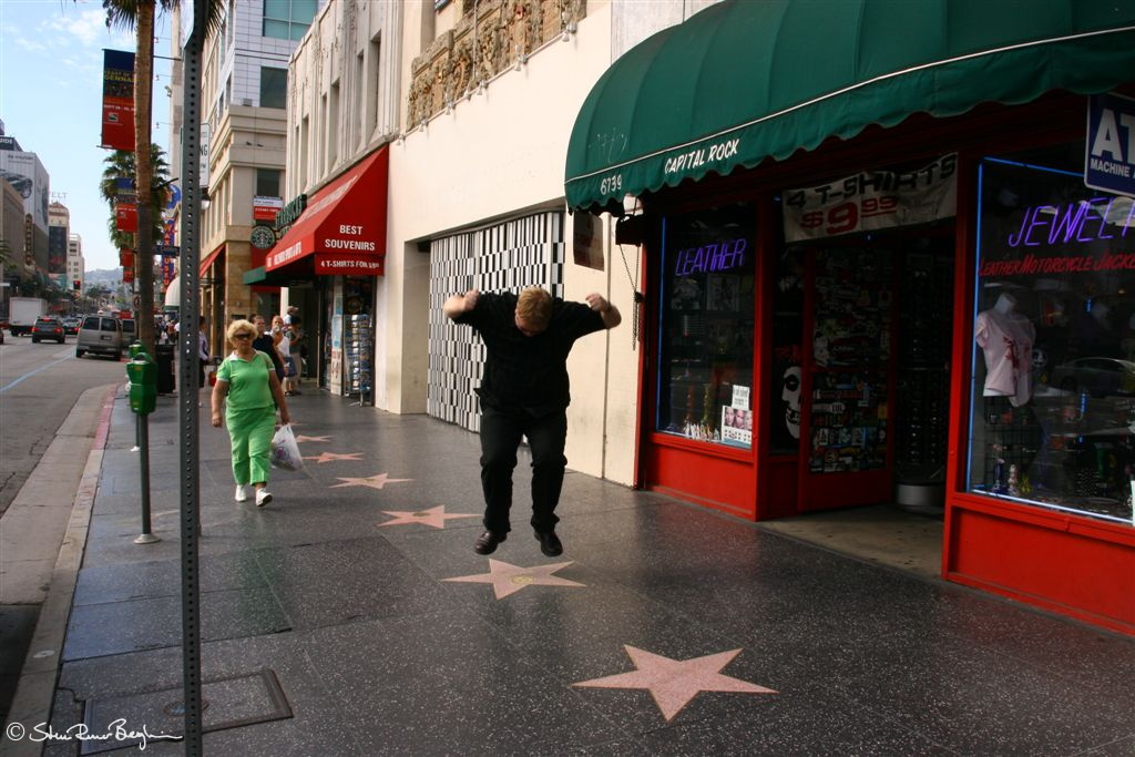 Runar stomping on Liberace's star on Hollywood Walk of Fame