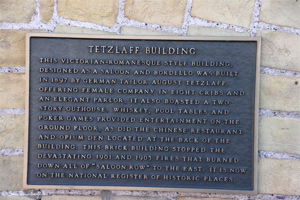 Plaque with history of the Red Garter building