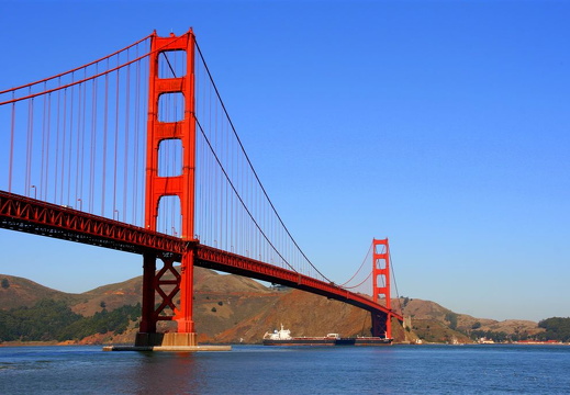 Tanker vessel passing under the Golden Gate bridge