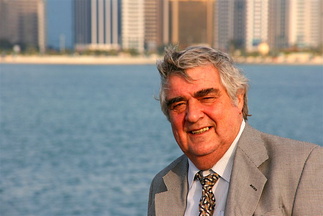Oskar in front of the Abu Dhabi Corniche
