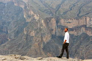 Kyrre in front of a waterfall on Jebel Shams