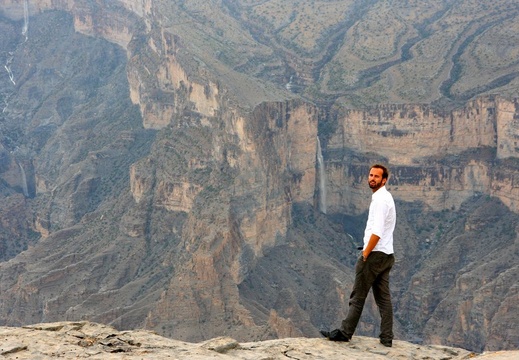 Kyrre in front of a waterfall on Jebel Shams