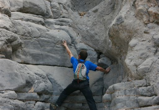Chad Jerry pretending to climb on the photographer's command
