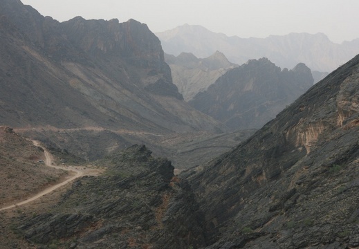 Road, football field, mountain and canyon