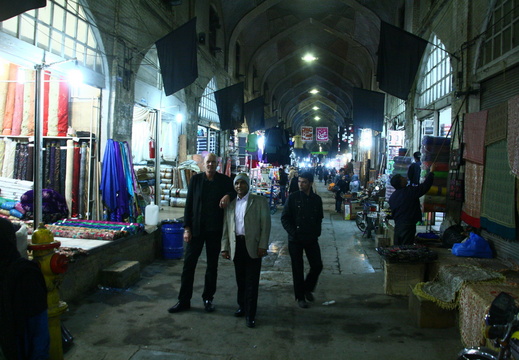 Two posing and one looking in Vakil Bazaar