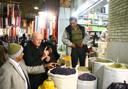 Spice tradesman being re-educated on the specifics of his trade by architect
