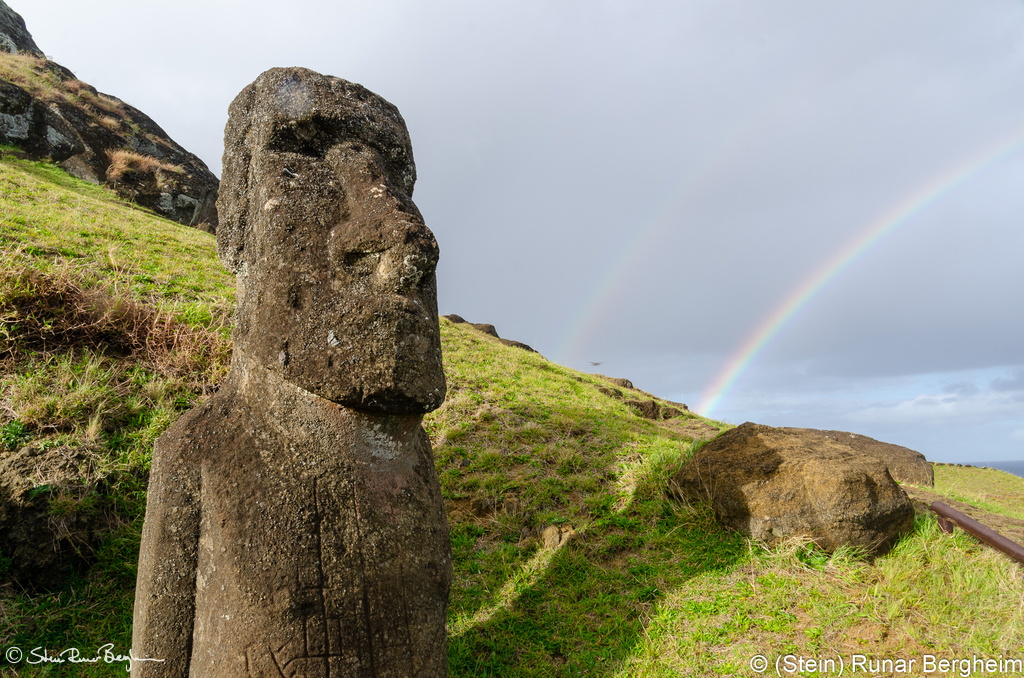 Rainbow by Moai on the southern slope of Rano Raraku