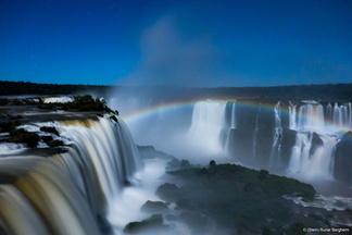 Rainbow in moonlight over Foz do Iguassu