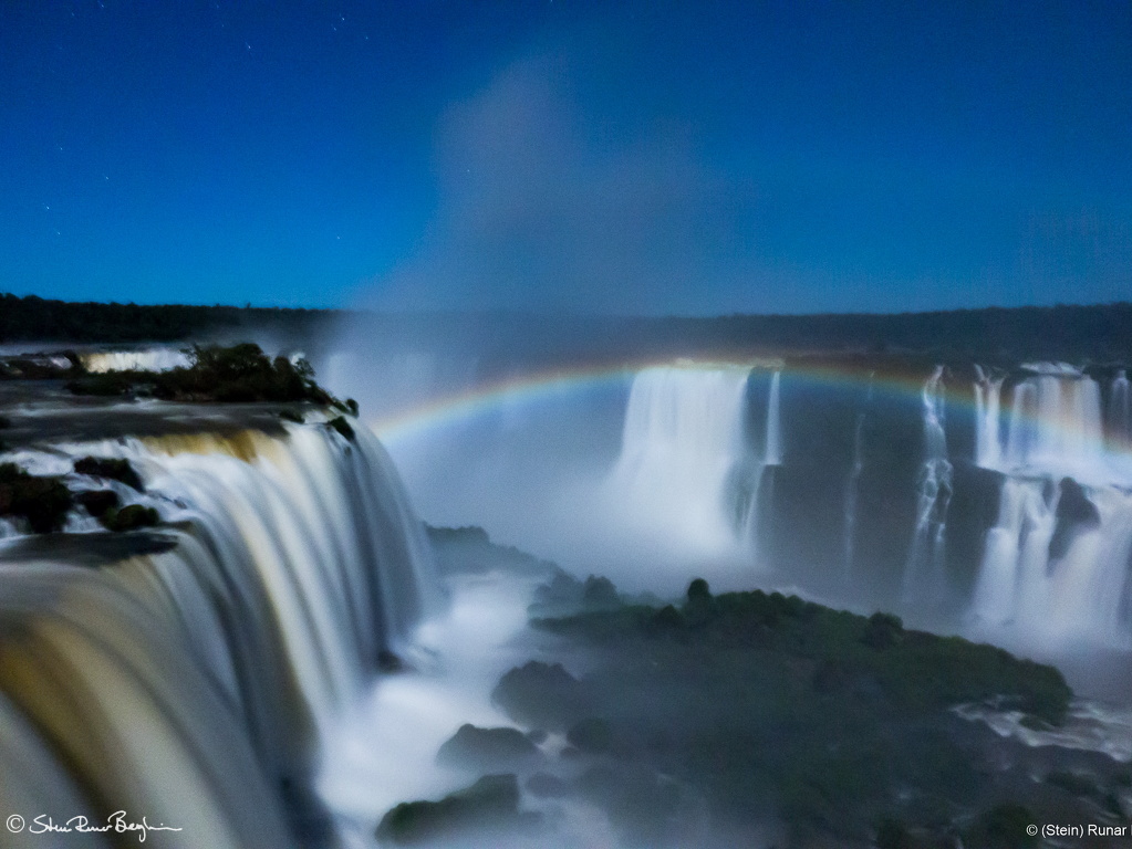 Rainbow in moonlight over Foz do Iguassu