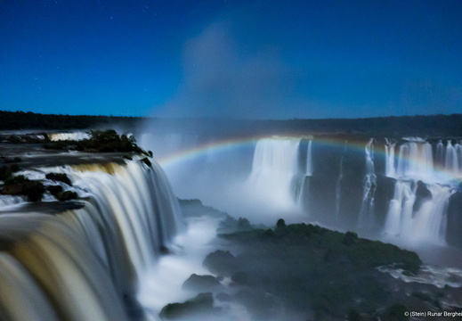 Rainbow in moonlight over Foz do Iguassu