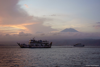 Boats in the Sundae Strait, Ijen volcanoes in the background 