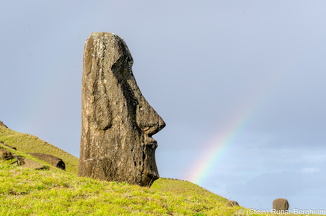 Rainbow by Moai on the southern slope of Rano Raraku